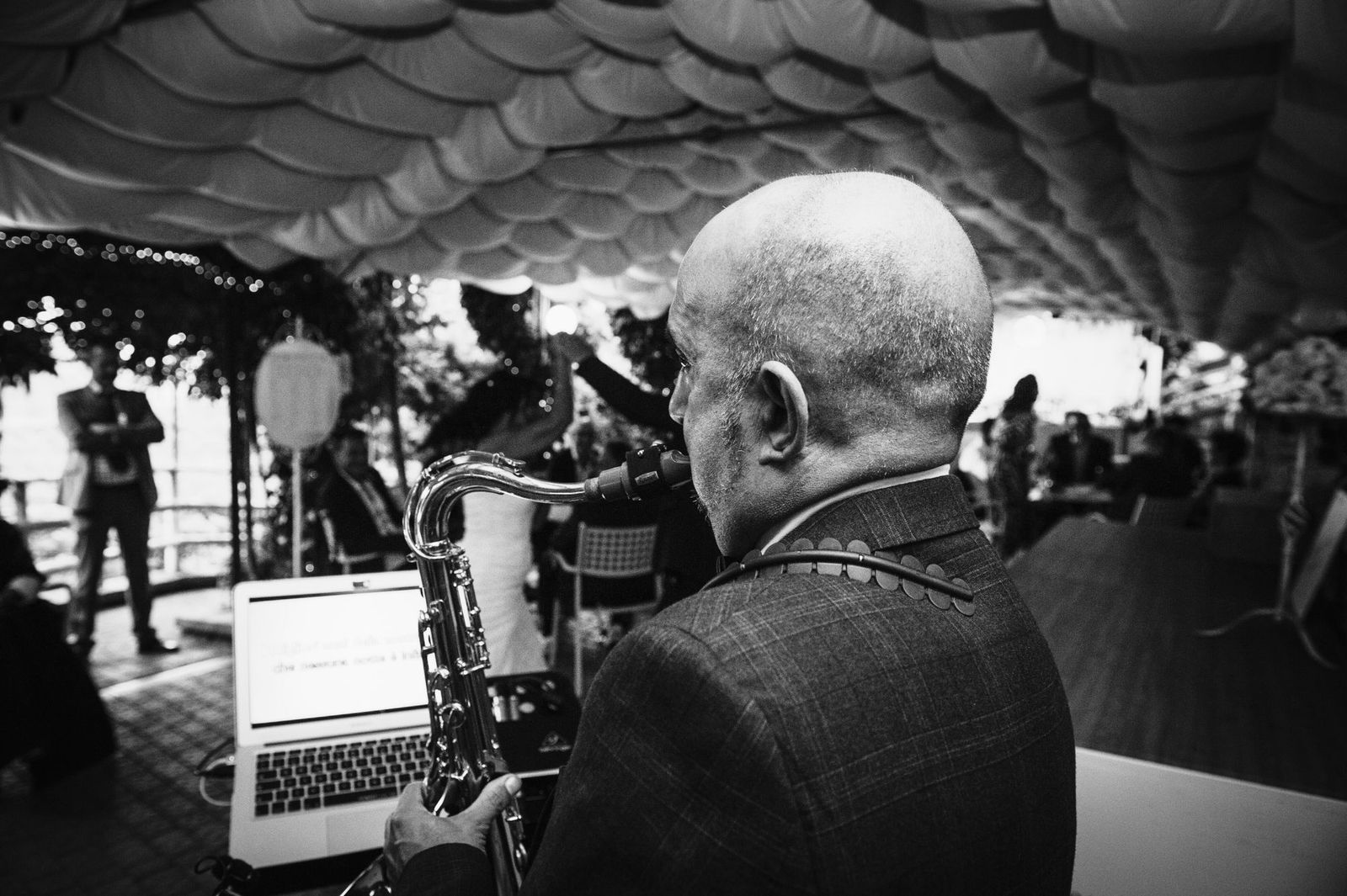 Saxophonist playing at a wedding reception